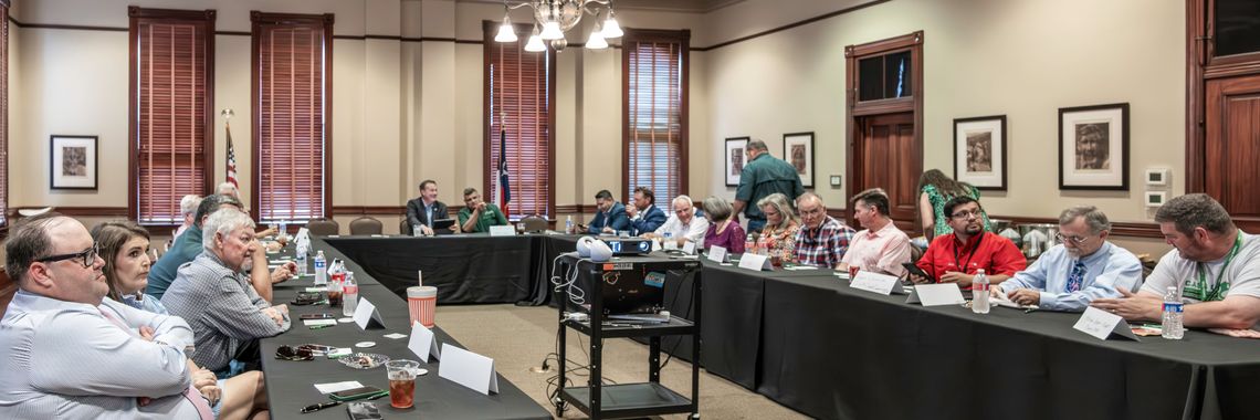 County and city officials, along with economic development and community leaders from Cuero, Yoakum, and Yorktown, gathered to discuss their concerns with Congressman Michael Cloud at the DeWitt County Leaders Roundtable meeting at the Chisholm Trail Heritage Museum on May 29.