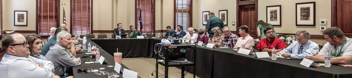 County and city of_cials, along with economic development and community leaders from Cuero, Yoakum, and Yorktown, gather to discuss their concerns with Congressman Michael Cloud at the DeWitt County Leaders Roundtable on May 29 at the Chisholm Trail Heritage Museum. (Photo by Ele Chew)