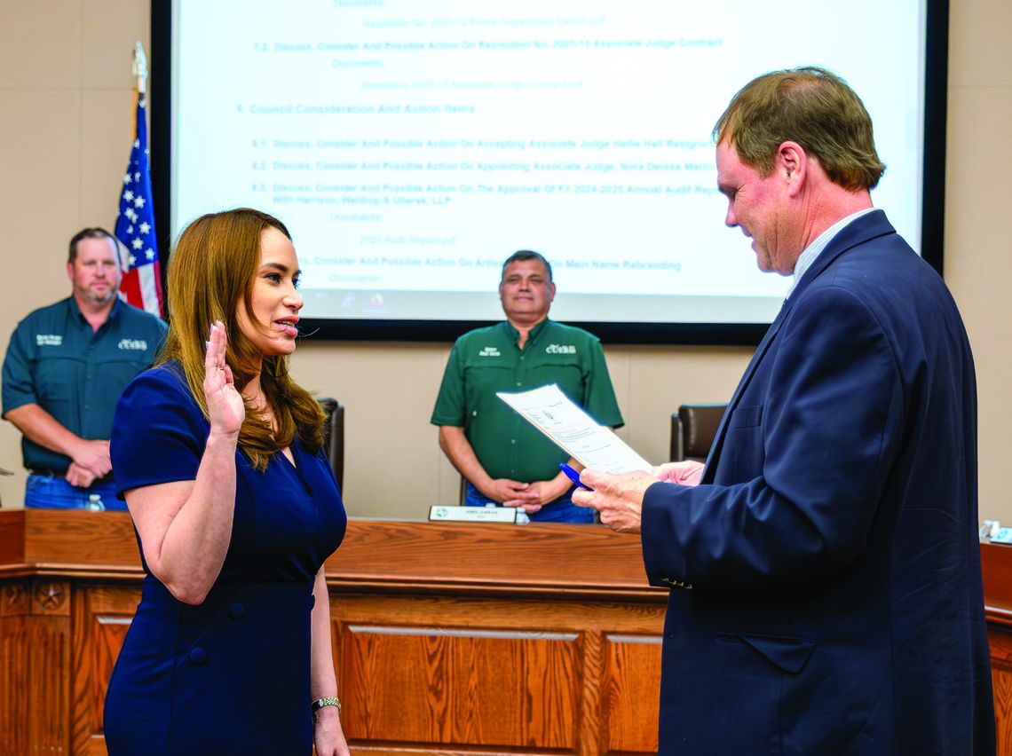 City Attorney James K. Crain III swears in Associate Judge Nora Denise Martinez on April 14, 2025 at Cuero City Hall Chambers. (Photo by Ele Chew)