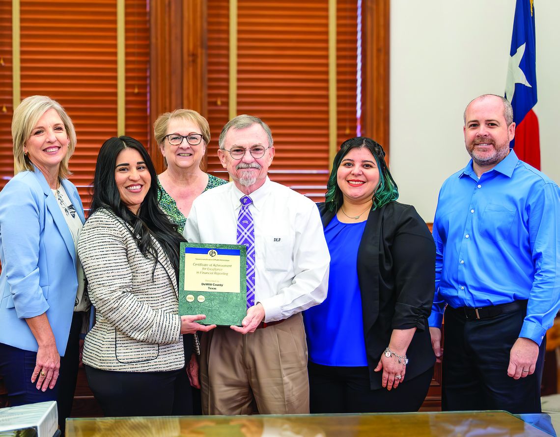 Melissa Terry, a CPA and a partner with Harrison, Waldrop, Uherek, LLP, presented a Certificate of Achievement for Excellence in Financial Reporting and an Award of Financial Achievement to Neomi Williams, County Auditor, and her staff. Shown are, from left, Melissa Terry, Neomi William, c...