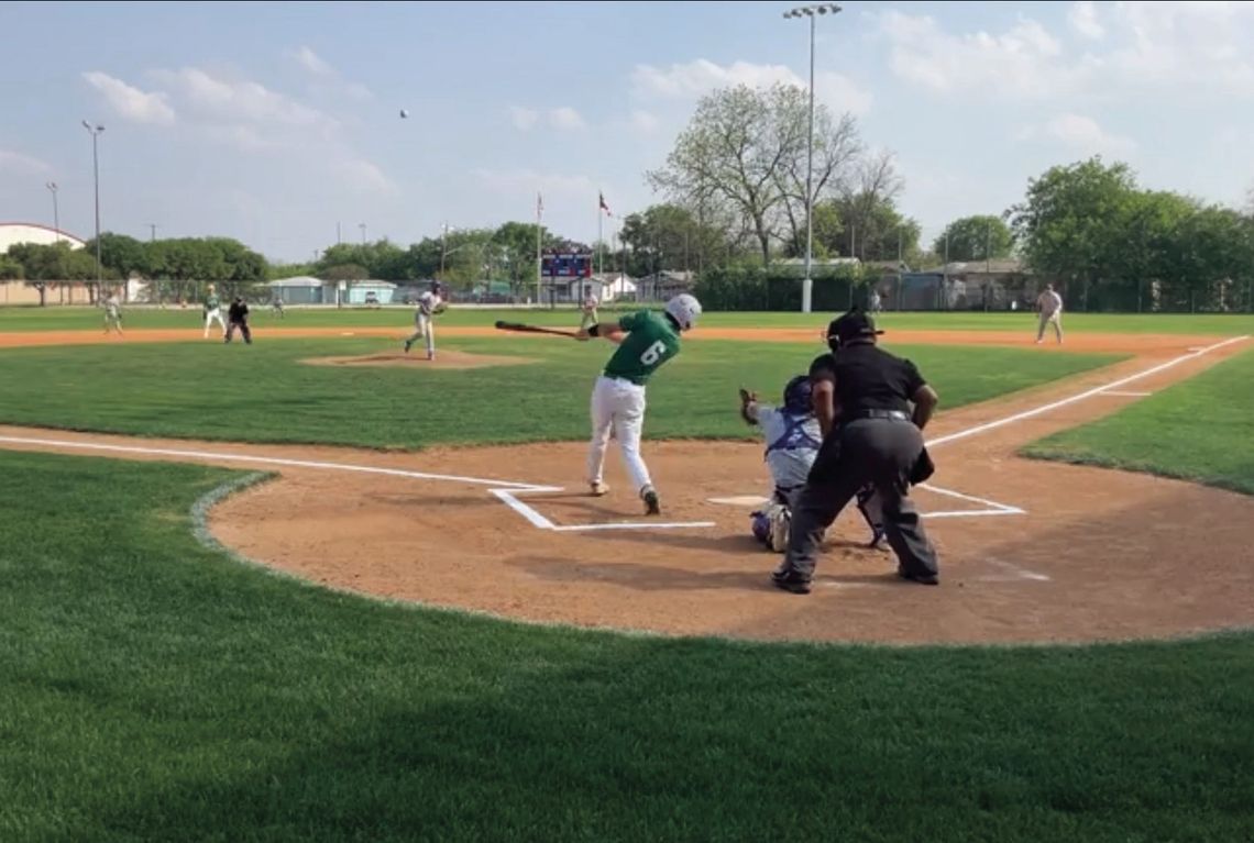 Eli Garrett hits a home run at his first at bat versus SA Memorial. The Gobblers won the district game 16-0. Photo by Laura Patek