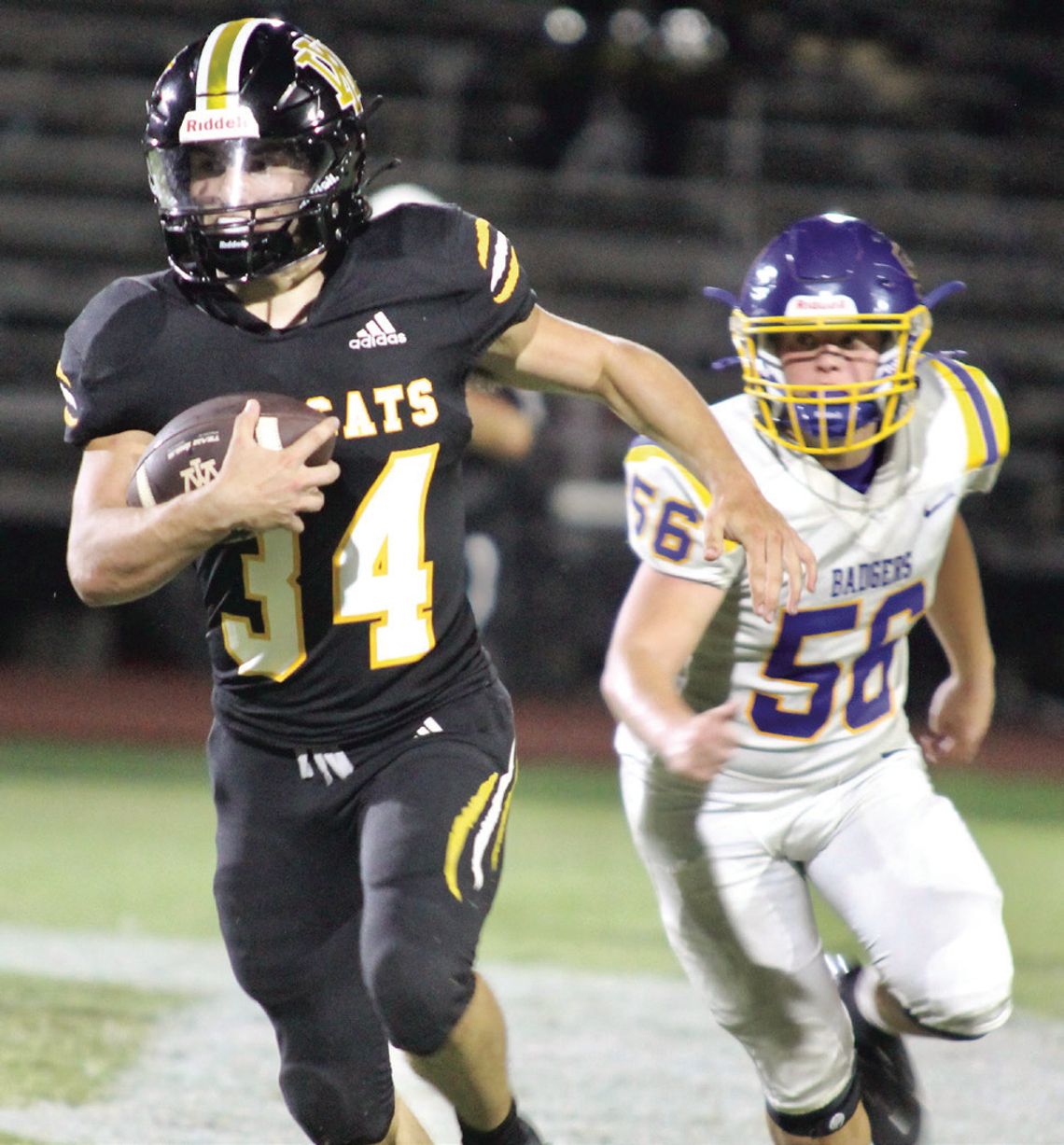 Calvin Duprie rushes past his opponent. PHOTOS BY DEIRDRA ALEXANDER