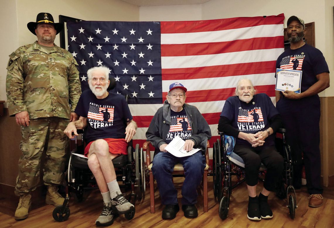 In the center are three of the 13 veterans who were honored with a special pinning ceremony on November 19. L-R: Jeff Zengerle (TNG), Thomas Slater (USMC), Donald Stokes (USA), Gordon Kaiser (USA), and Kenneth McCarthy (USN). CONTRIBUTED PHOTO