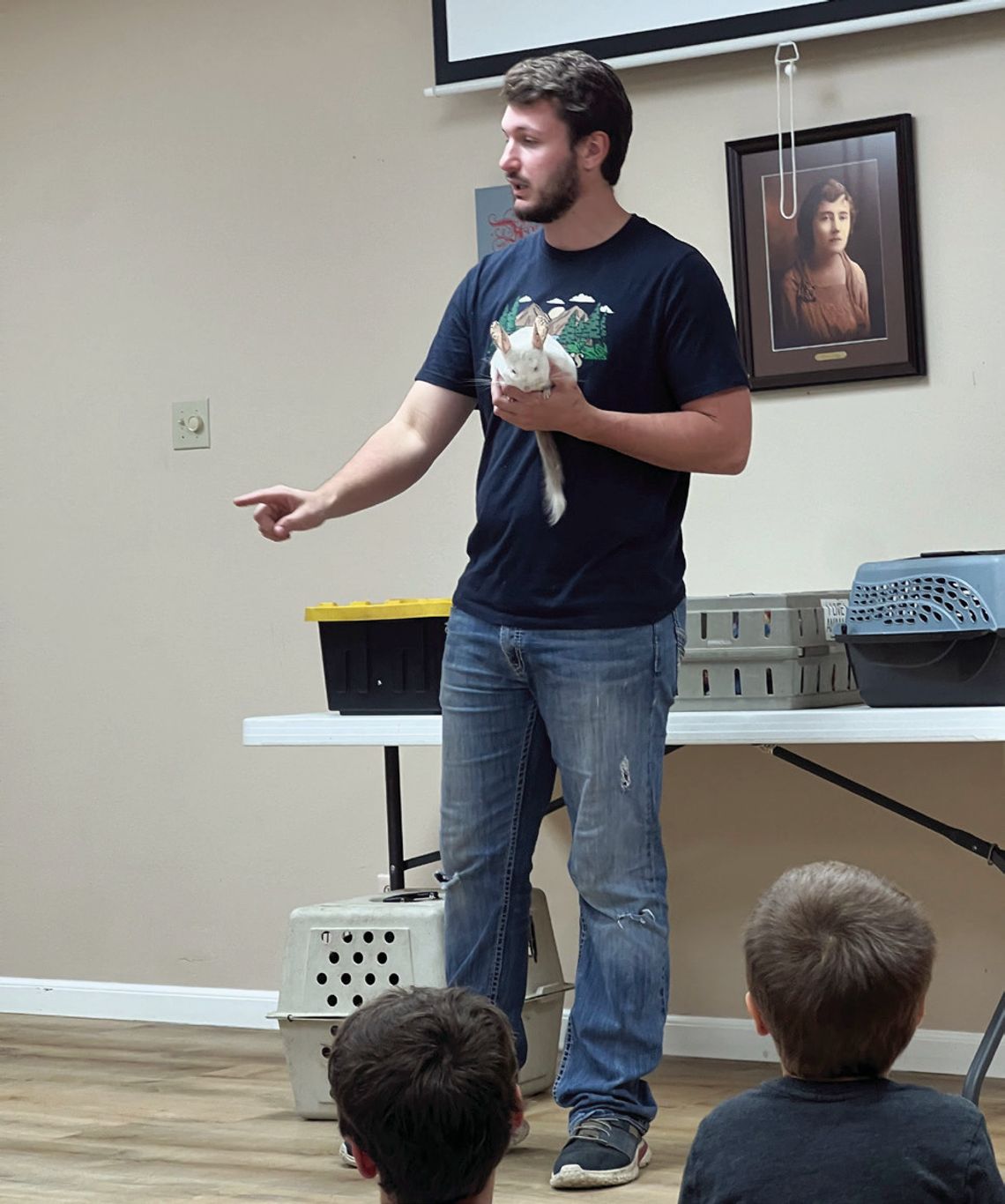 Dylan McDaniel with Wild Things Zoofari describes his chinchilla name Henry to children at the Yorktown Public Library. This week’s Friends of the Library program welcomes the Texas Snake Man at 10 a.m. on Wednesday. CONTRIBUTED PHOTO