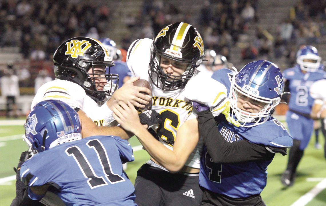 Yorktown quarterback Brody Metting pushes for more yards in the playoff game against Ben Bolt on Friday, which ended in a hard fought 38-19 loss. PHOTOS BY DEIRDRE ALEXANDER