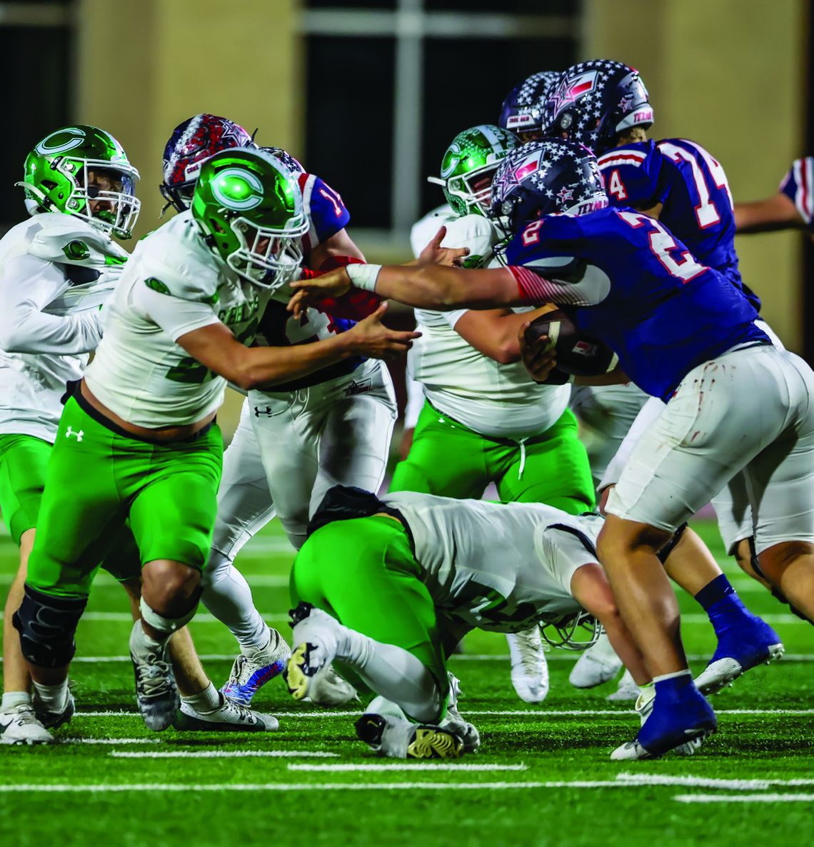Jace Gamez attempts to make a tackle on Wimberley Quarterback Cody Stover Friday night.