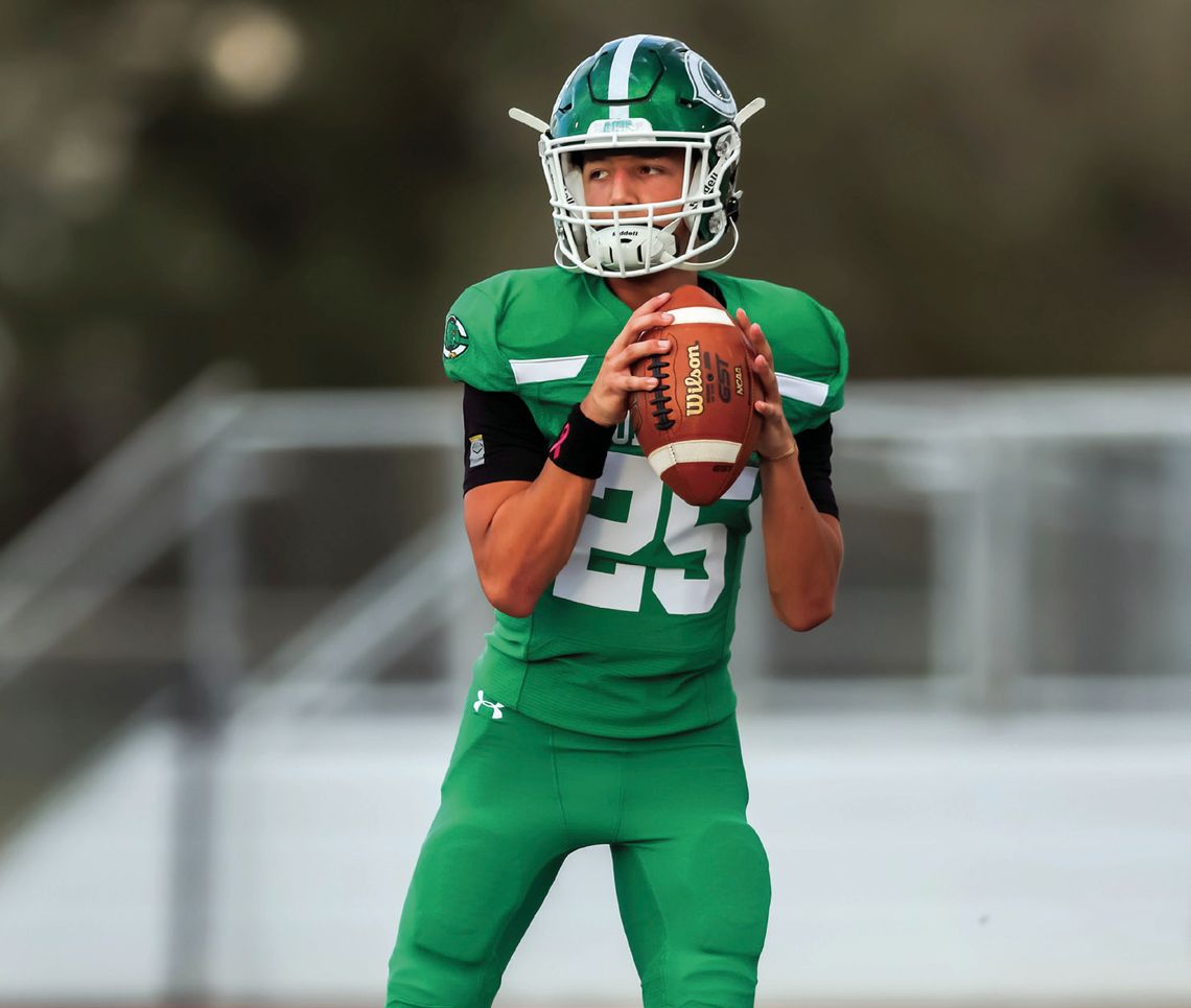 In the absence of injured QB Jaxxon Marie, sophomore Jayce Guajardo stepped up to varsity quarterback in Friday’s game against Harlingen. The Gobblers won the nail biter 24-14. (Photos by Mike Cantu)
