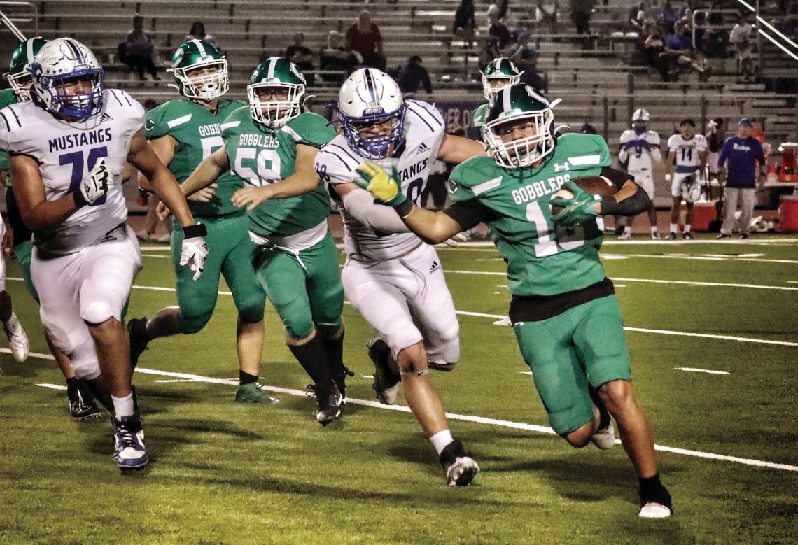 Jaxon Timpone gets yards on a run against Ingleside. Cuero won Friday’s match against the Mustangs, 40-14. (Photo by Sonya Timpone)