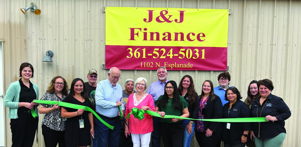 The Cuero Chamber of Commerce hosted a ribbon cutting to celebrate the re-opening of J &amp; J Finance, which is owned by Wayne and Sherry Toney, center. (Staff Photo)