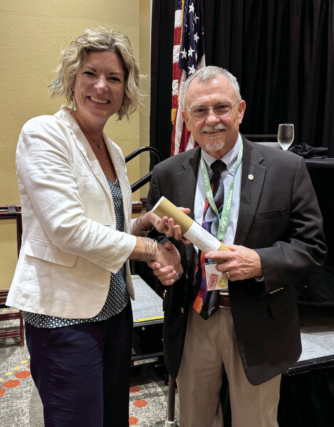 DeWitt County Judge Daryl Fowler accepts his Commissioners Court Advanced Curriculum Certificate of Achievement from Comal County Commissioner Jen Crownover, 2023-24 President of the County Judges and Commissioners Association of Texas. CONTRIBUTED PHOTO