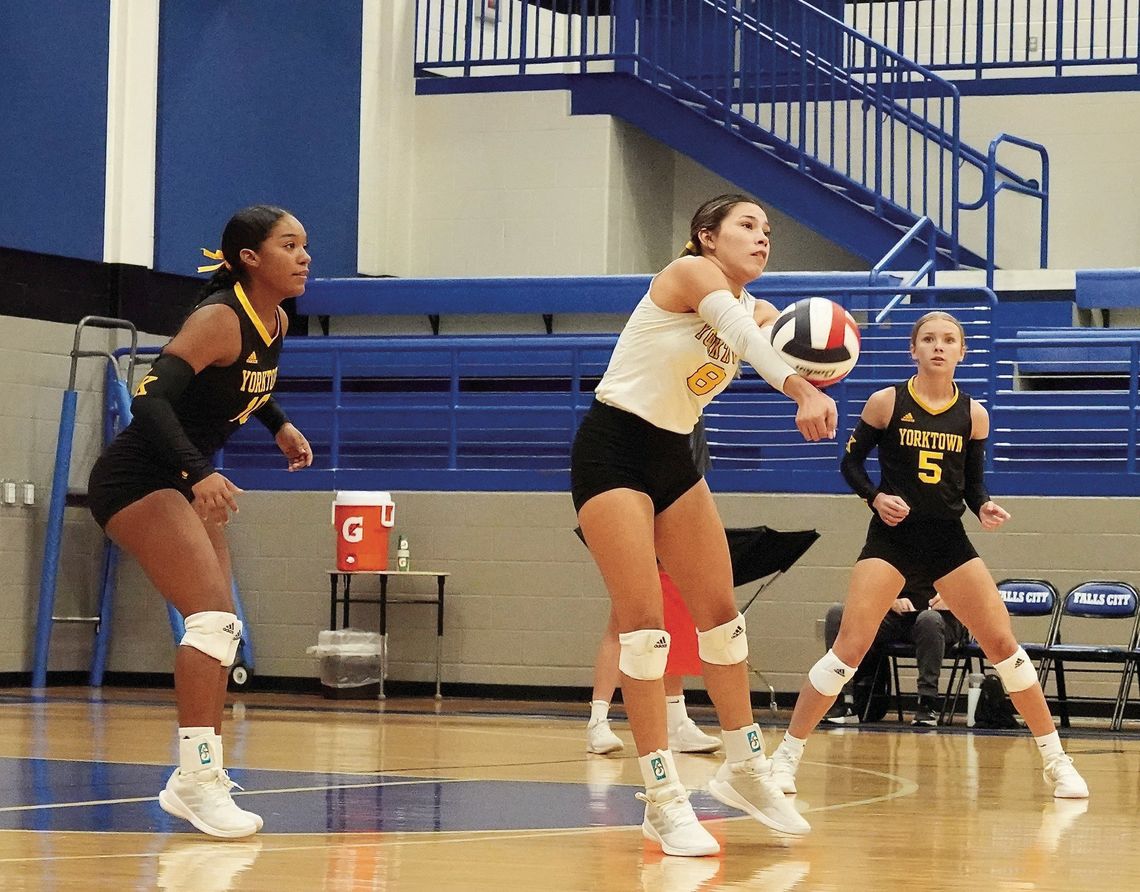 Libero Nina Villarreal digs up a pass against a tough district opponent. PHOTOS BY VALERIE STUART