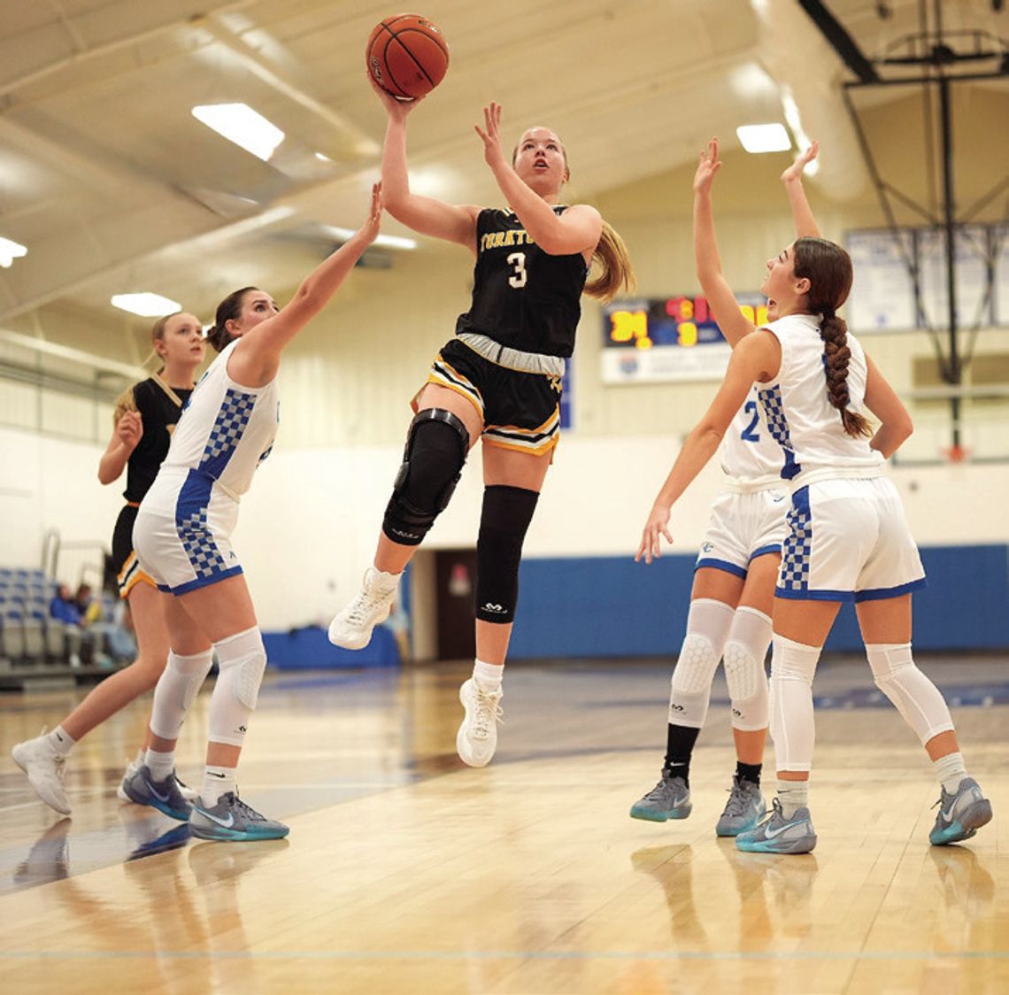 Senior Sydnie Krueger goes up for a basket against McMullen County. CONTRIBUTED PHOTOS