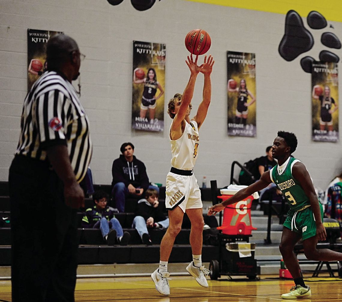 Wildcat junior Brody Metting makes a 3-pointer to start the game against Woodsboro.