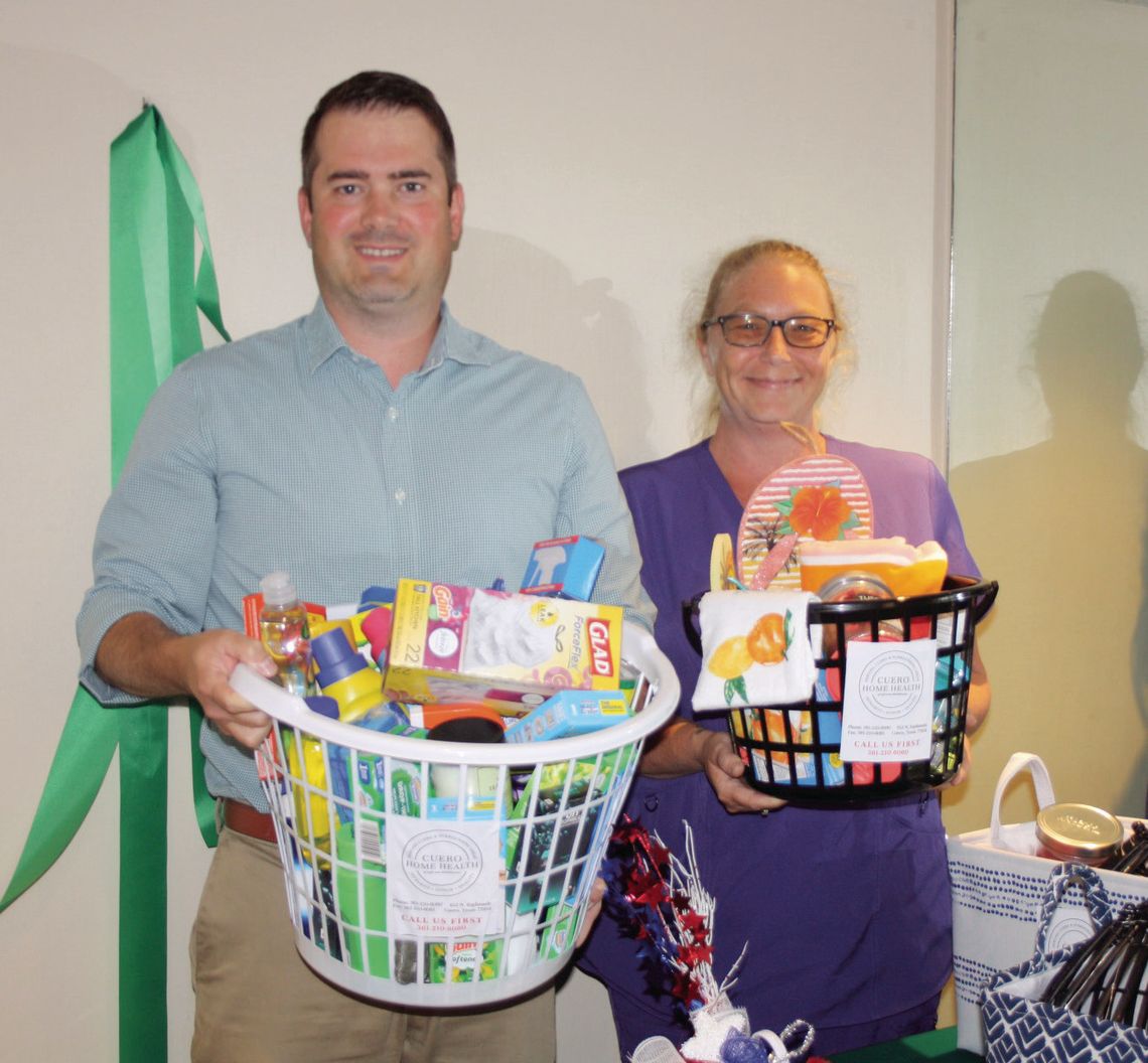 Jay Babcock (L) and Cory Smith (R) hold raffle baskets at the Cuero Home Health office, 613 Esplanade. Proceeds from the ongoing raffle will help homebound patients with extra necessities during the Christmas holidays. Tickets can be purchased for $5 at the office during business hours wit...
