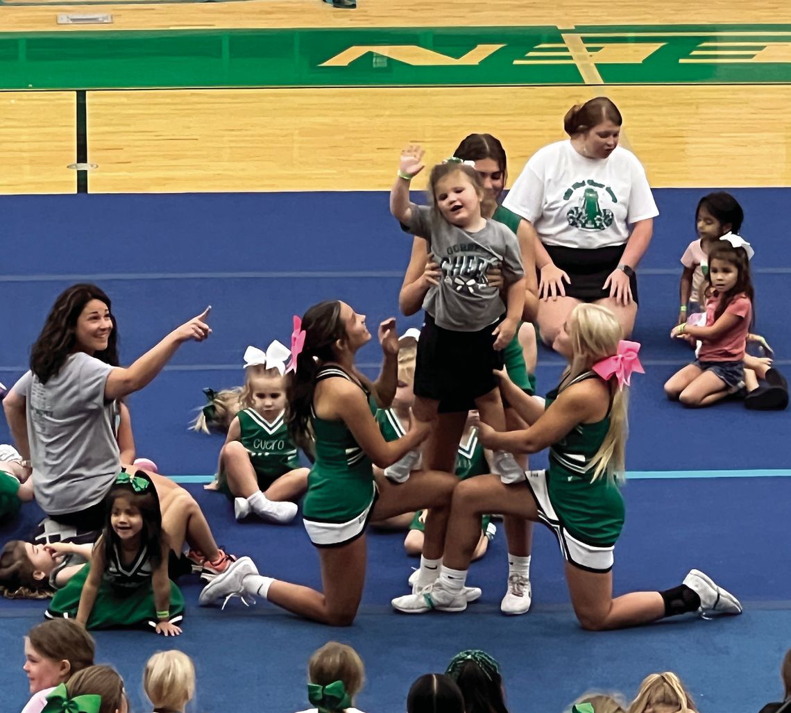 Look for mini cheerleaders at Friday's game