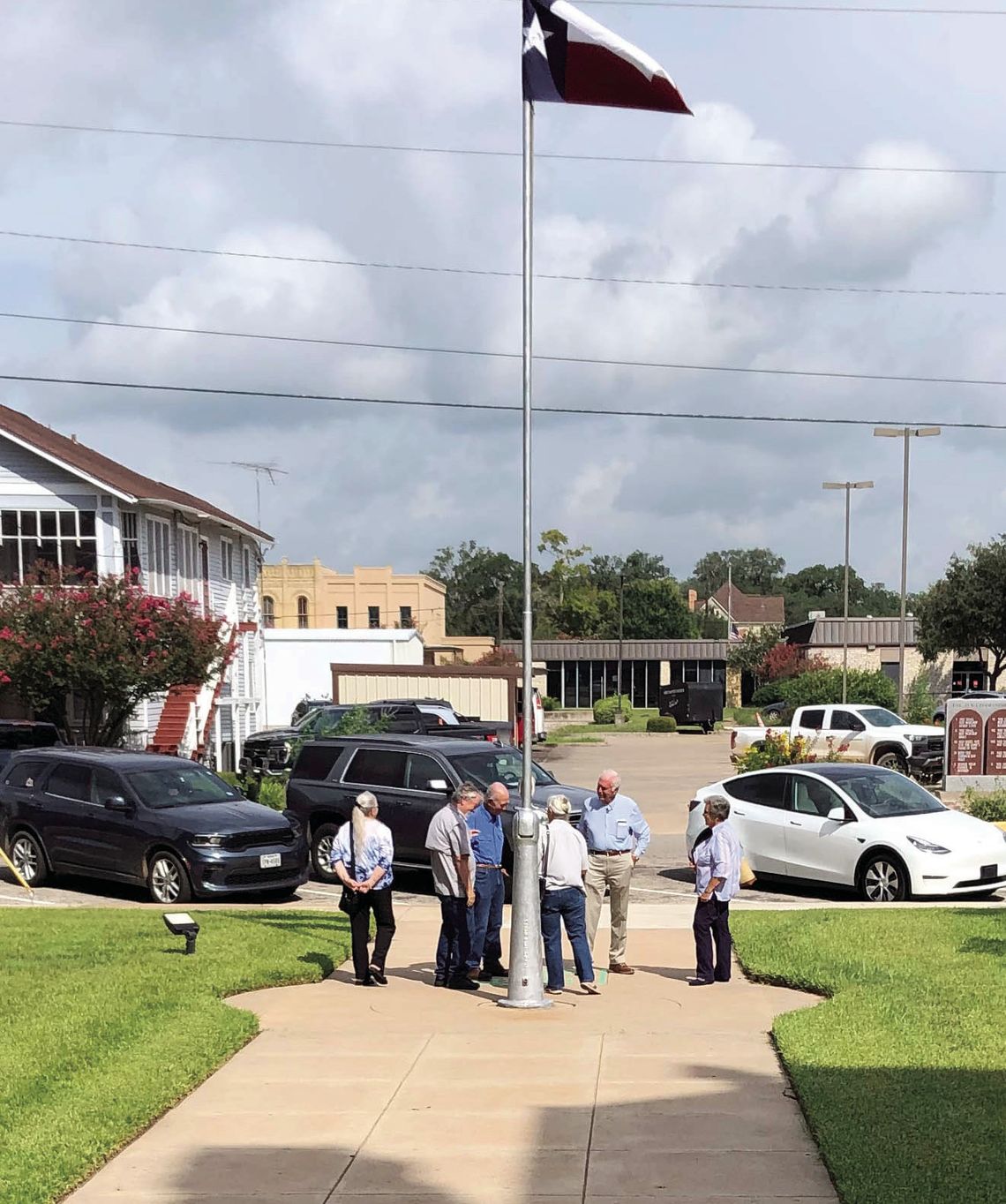 Members of the DWC Historical Commission pause with Bill Blackwell and Fain McDougal at the site in front of the courthouse where Colonel William Travis’ Letter from the Alamo will be installed