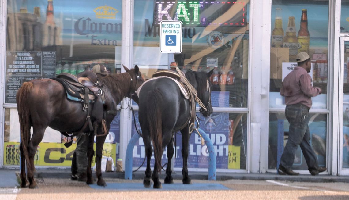 Not much has changed in the last century or so for folk needing supplies in Cuero on Morgan Street. Just tie off the horses and pop in for provisions like these riders on May 7, 2025. (Staff Photo)