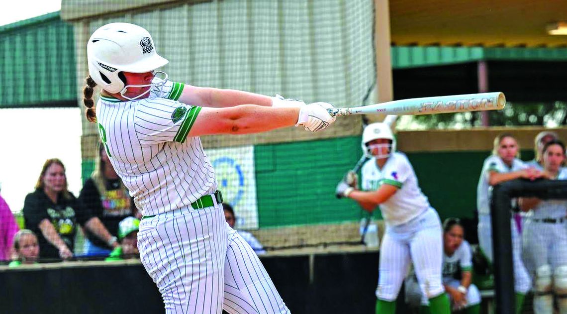 Julianna Cox blasts one over during the game against Wimberley. Cox had two home runs in the series.