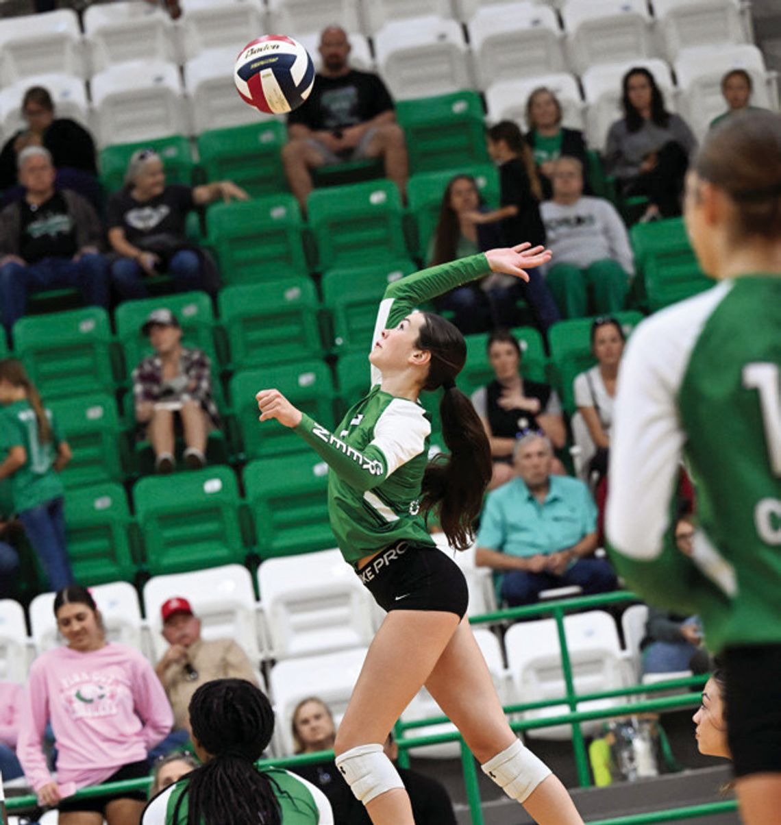 Jessa Cox goes up for a hit