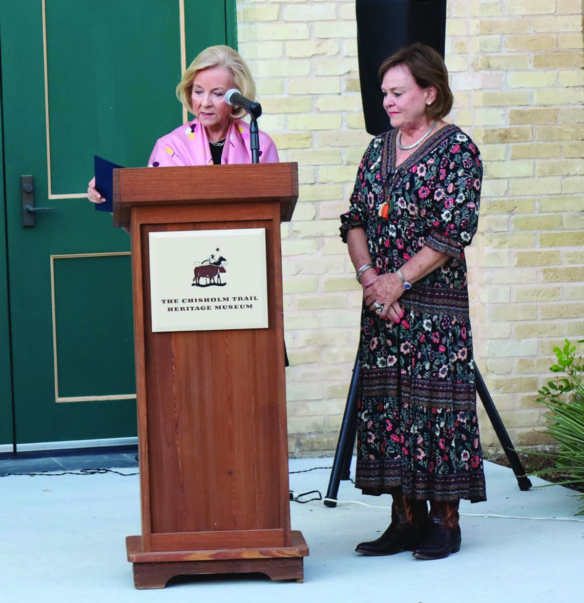 Rep. Geanie W. Morrison reads a state proclamation recognizing the service of outgoing Chisholm Trail Heritage Museum Director Susan Weber. STAFF PHOTO