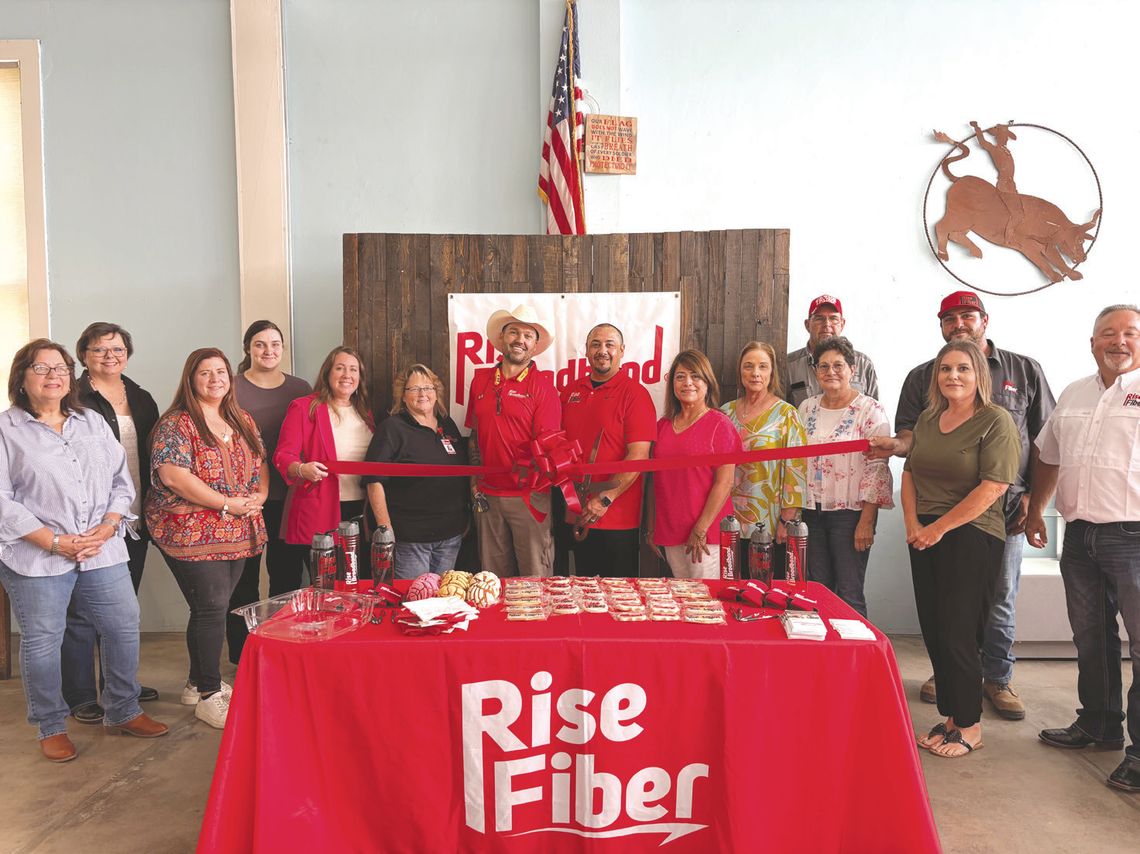 Rise Broadband celebrated its official grand opening on May 6, hosted by the Yorktown Chamber of Commerce. Manager Steven Lujan, center, cut the ribbon along with Ryan Doyle and Connie Herman, to the left. Also from Rise Broadband on the far right was Kyle Peterson. STAFF PHOTO