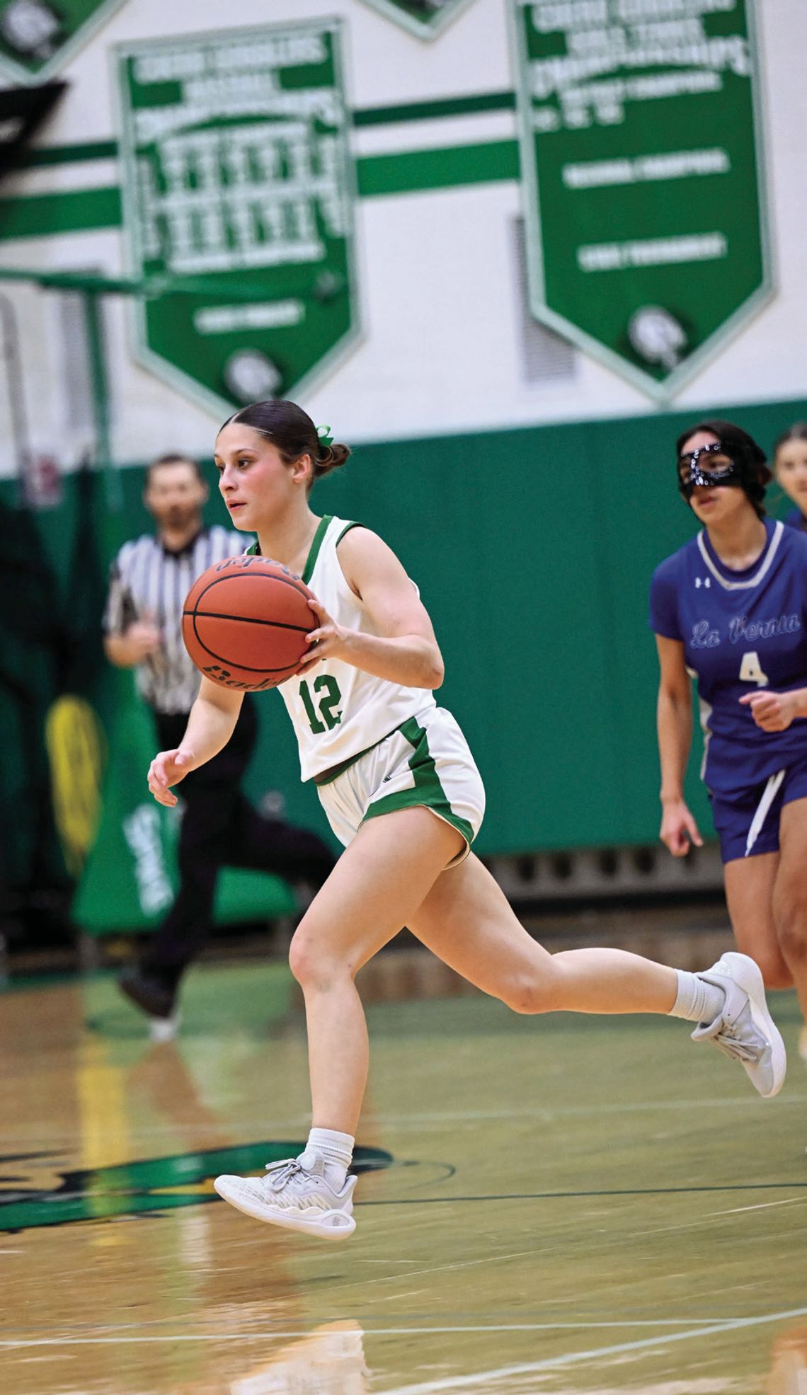 Senior Jaydie Cooper brings the ball down during the LaVernia game. (Photos by Courtney Kubesch)