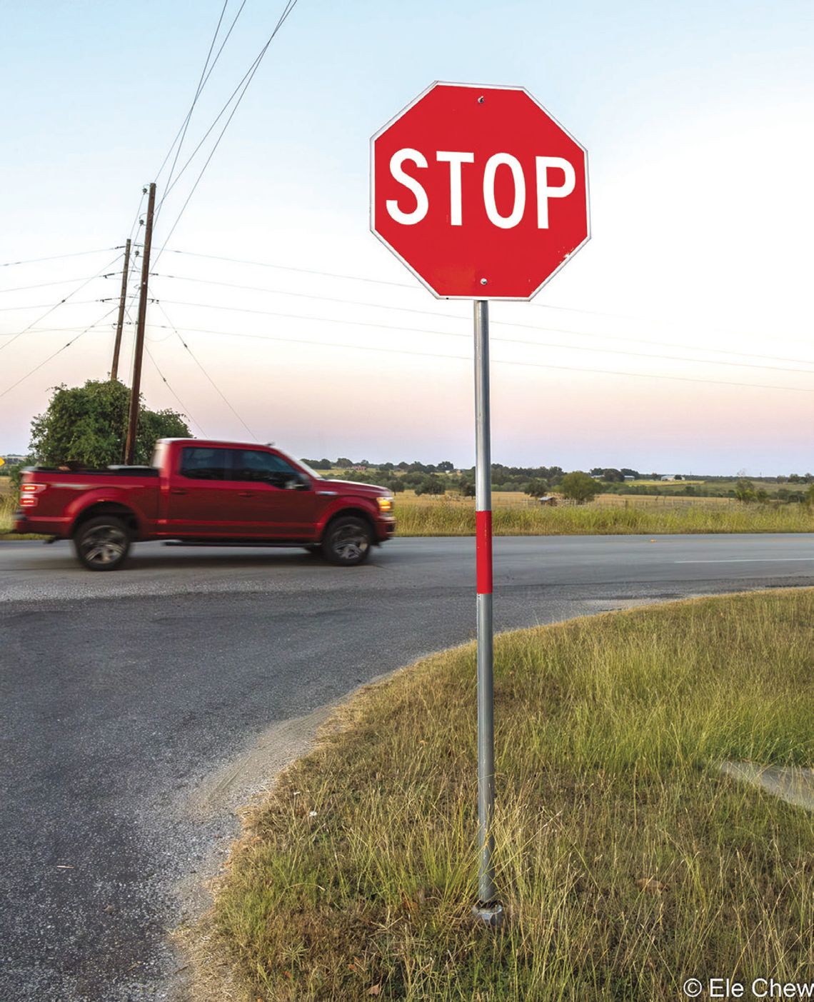The stop sign at Bootlegger Lane and TX 111 Intersection prevents collision. (Photo by Ele Chew)
