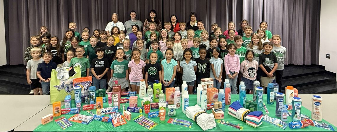 Students collect for CAMAL House