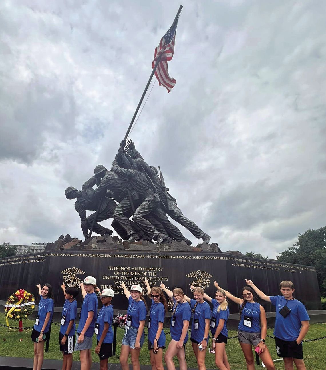 Yorktown students visit the United States Marine Corps Memorial and point at Yorktown native Harlon Block, who is crouching and closest to the ground. CONTRIBUTED PHOTO