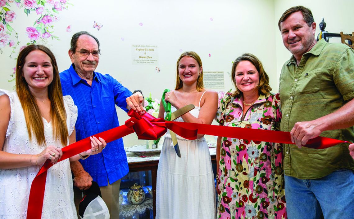 The Cuero Heritage Museum held a ribbon-cutting ceremony with the Giles Family to unveil The Patti Giles Collection of English Tea Pots and Biscuit Jars in the new Genealogy Room on May 21. PHOTO BY ELE CHEW