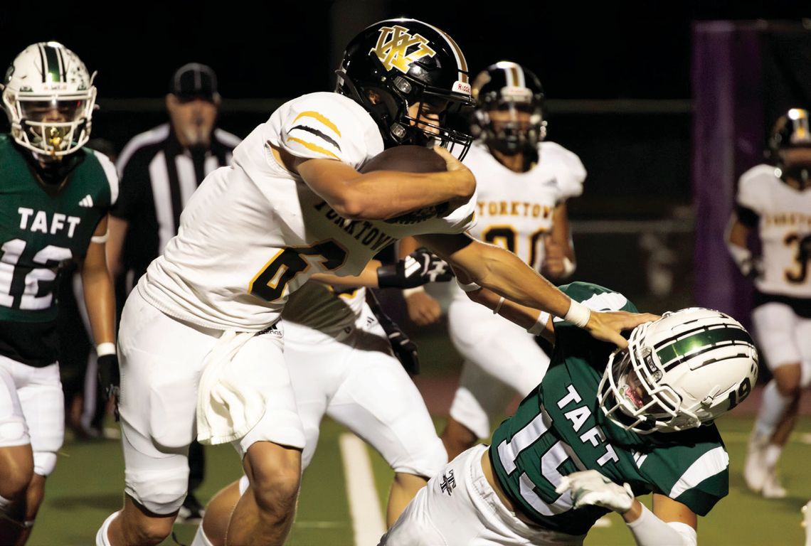 Brody Metting plows over his opponent. PHOTO BY ANDREW HAHN