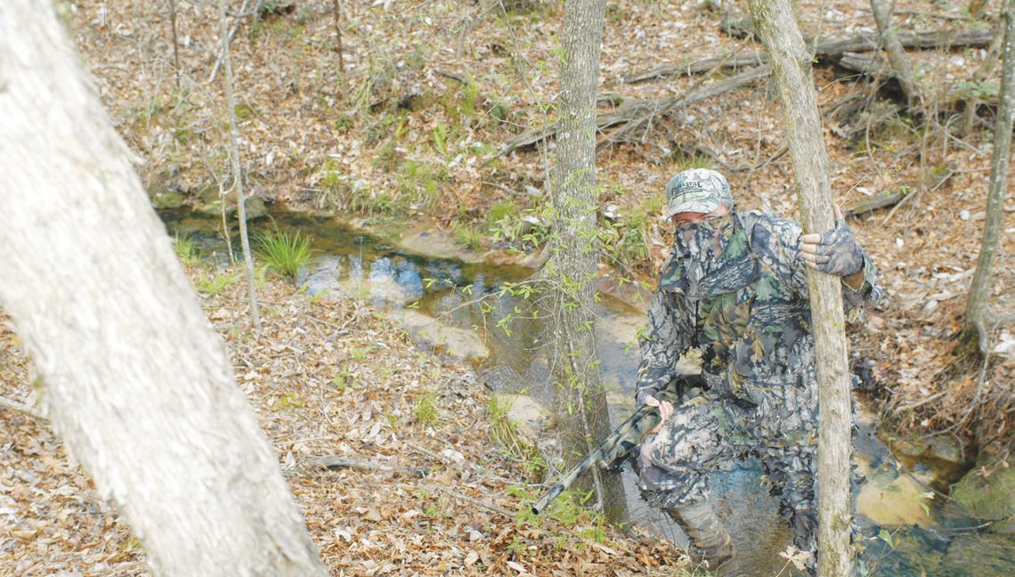 Knowing where creek crossings and other obstructions are at can be a big help when setting up on a gobbling bird. It’s always be set up in a manner the offers the bird the path of least resistance. (Photo by Matt Williams)