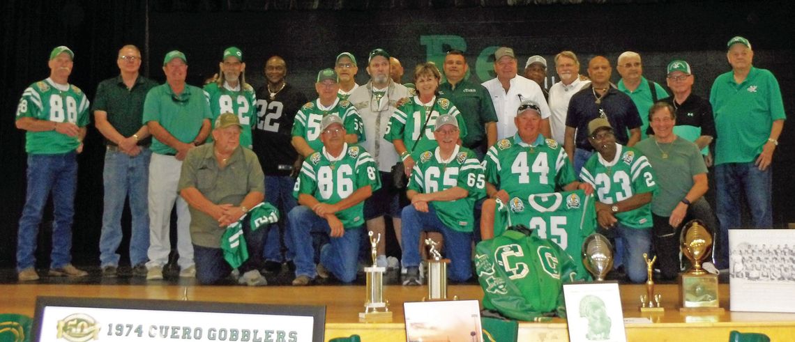 The 1974 Gobbler back-to-back state championship team members and coaches gather at their reception on September 20 in the Cuero High School cafeteria. (Contributed Photo)