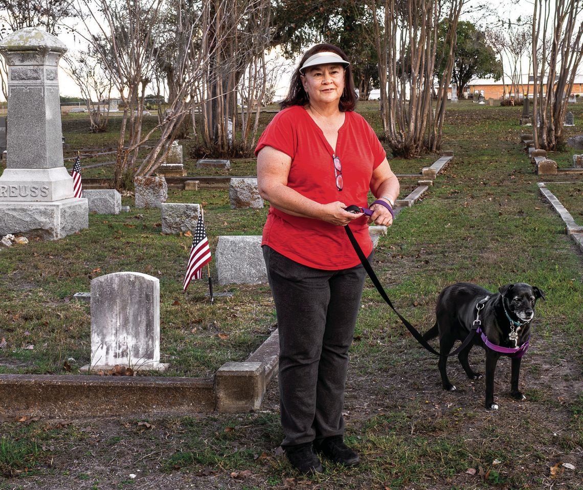 Kaye Kahlich enjoys walking her dog at Hillside Cemetery. If you have fitness goals, Hillside Cemetery is a great place to pursue them, enjoying fresh air while jogging or walking. (Photo by Ele Chew)