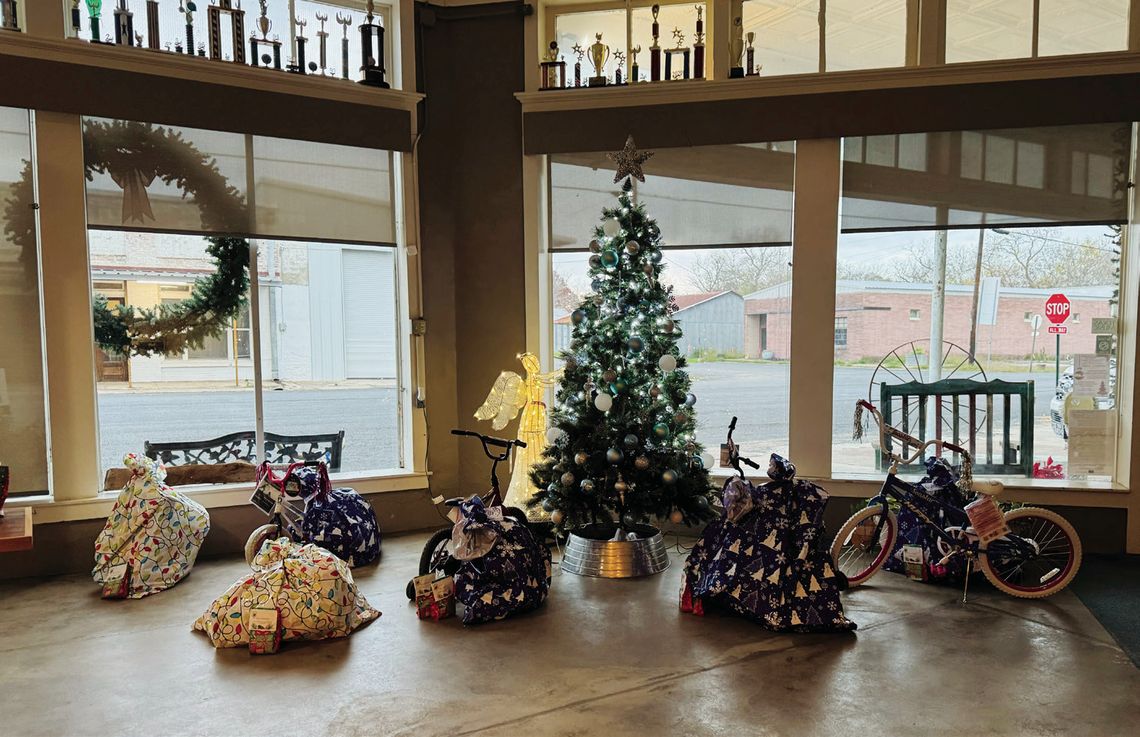 Presents under Cowboy Claus Tree are waiting for children to pick them up on December 19 from 5:30 to 6:30 p.m. CONTRIBUTED PHOTO